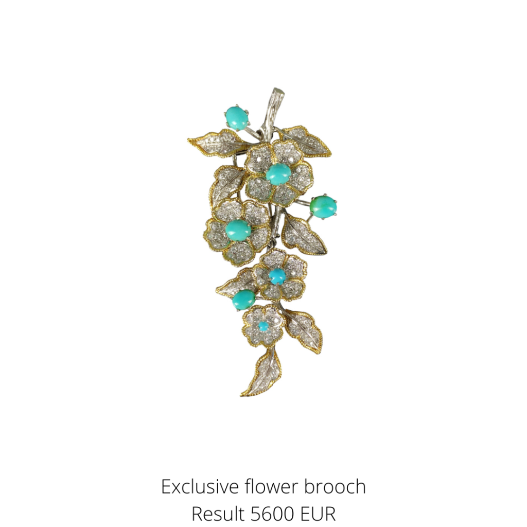 Handcrafted exclusive Bulgari style flower brooch features a branch with four flowers and leaves, set with turquoise cabochons and a total of 246 diamonds in pavé setting.
A highlight from the jewellery category.