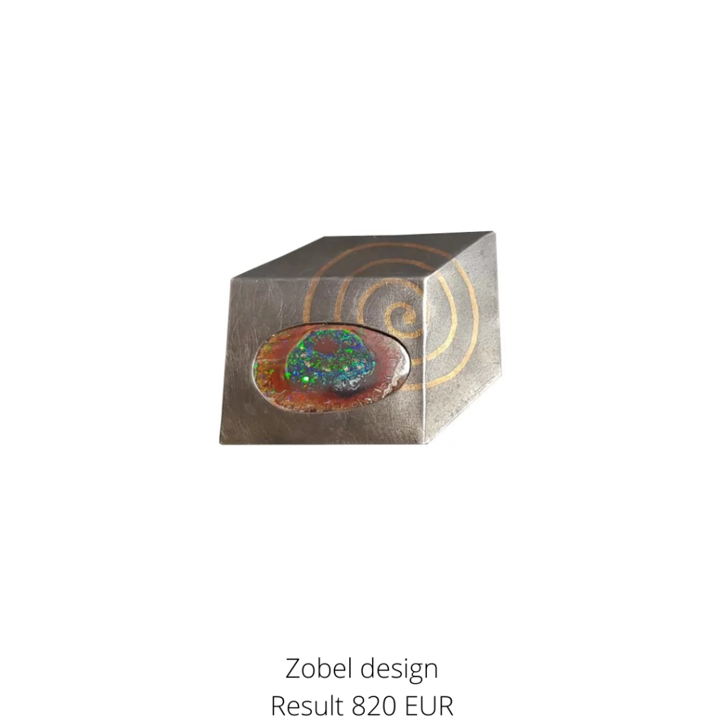 Design brooch by Constance goldsmith Michael Zobel with bordered boulder opal.
A highlight from the jewellery category.